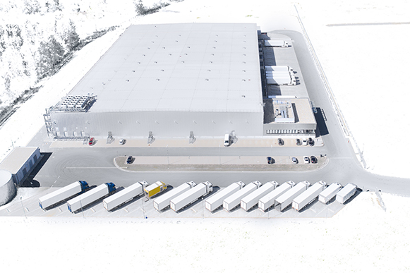 Loading bay, truck parking lot, industrial building, logistics - aerial view